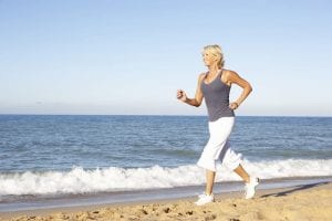 Woman running on the beach