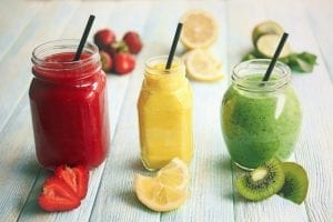 Refreshing fruit smoothies on a table