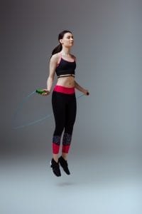 Woman jumping rope for exercise